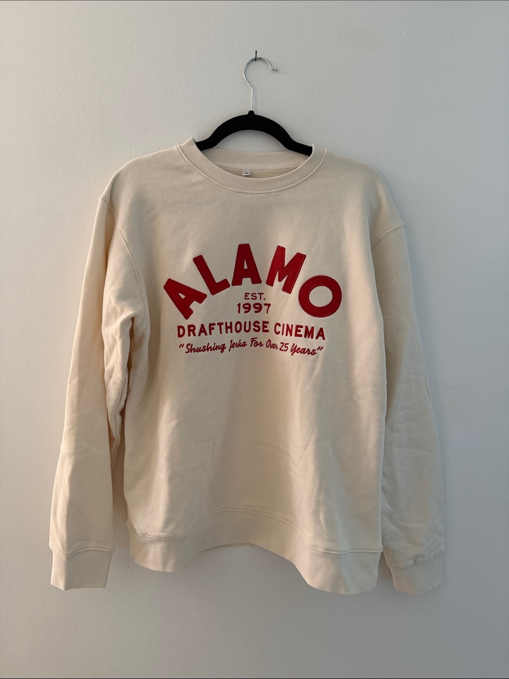 Alamo Drafthouse Cream Crewneck Sweatshirt with Red Logo